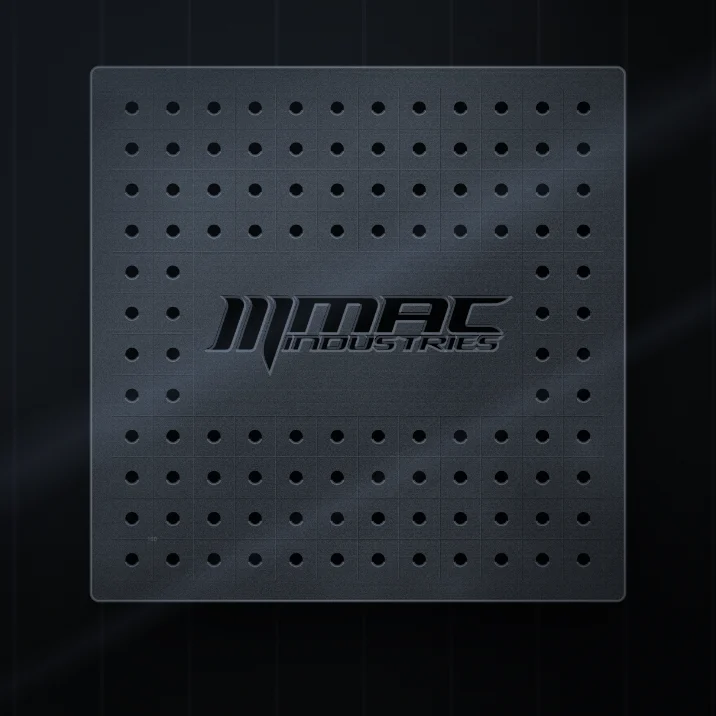 A finished 16D welding table top with the MAC Industries logo cut into it: 16 mm holes on a 50 mm grid, laser cut in Shobdon